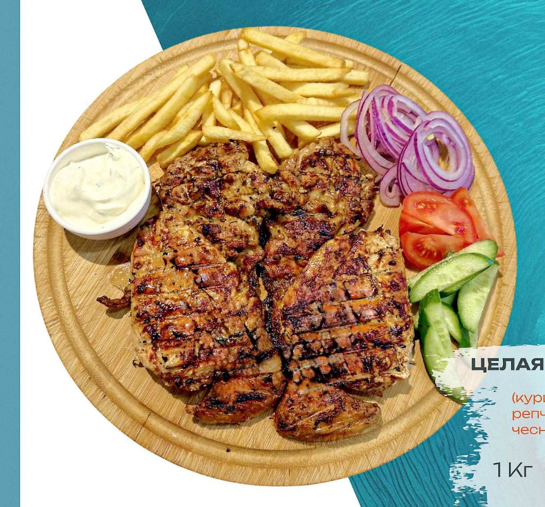 Целая курица на мангале